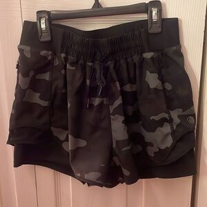 Black and dark gray camo athletic shorts